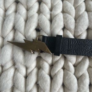 Kim white black leather belt with a bronze buckle